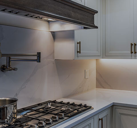 Modernize a dated kitchen and transform a cramped laundry room  